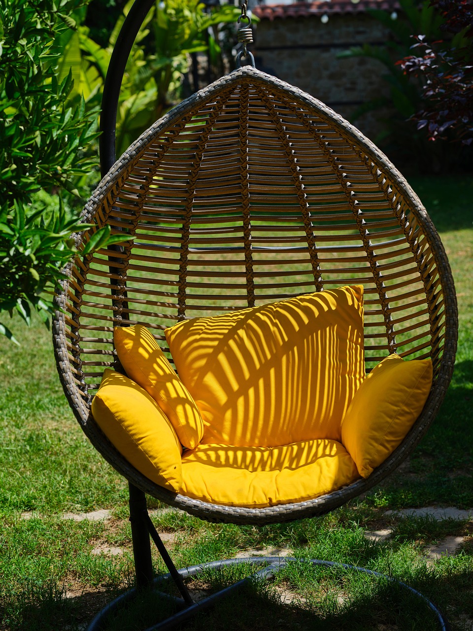 swing, seat, cushion, pillow, yellow pillow, decor, decoration, design, modern, garden, sunny, wicker, cafe, restaurant, summer, comfortable, furniture, nature, outdoors